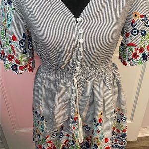 Cute button down dress.